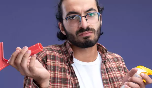 young man is looking ready to clean