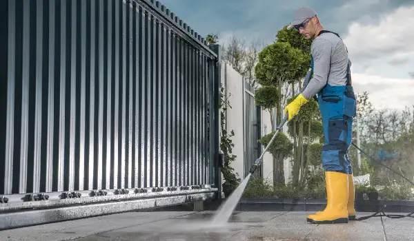 Front yard cleaning with pressure washing with safety scene