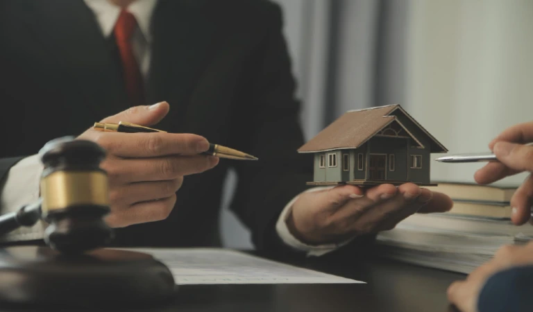 Business and lawyers discussing contract papers with brass scale on desk in office law legal services advice justice and law concept picture with film grain effect